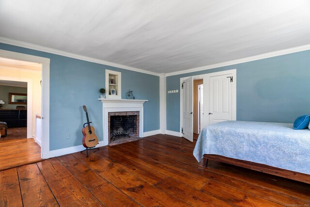 1696 Main St, Glastonbury, CT 06033 - bedroom featuring ornamental molding, a fireplace, baseboards, and wood-type flooring