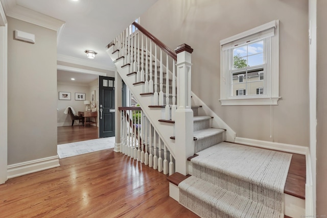 123 Richmond Hill Rd Unit 20, New Canaan, CT 06840 - staircase featuring wood finished floors, ornamental molding, and baseboards