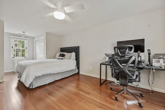 123 Richmond Hill Rd Unit 20, New Canaan, CT 06840 - bedroom featuring wood finished floors, an office area, and baseboards