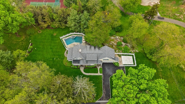 view from above of property with a pool area
