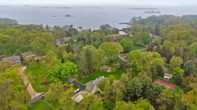 aerial view of property and surrounding area featuring a large body of water