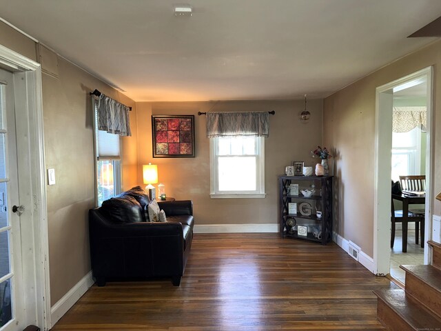 30 May St, Meriden, CT 06451 - living area with wood finished floors and baseboards