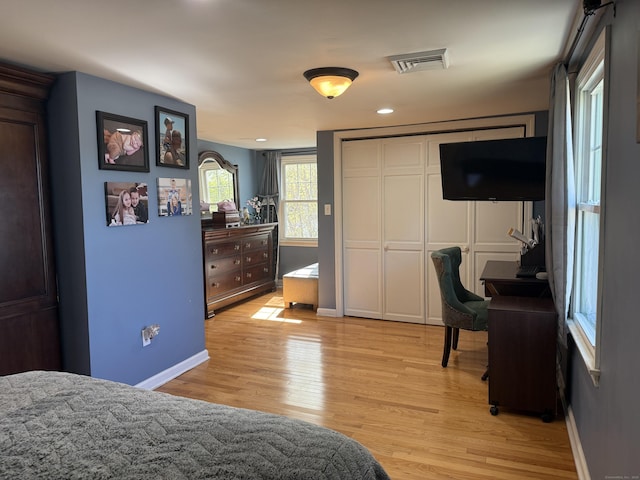 30 May St, Meriden, CT 06451 - bedroom with light wood-style flooring, baseboards, and a closet