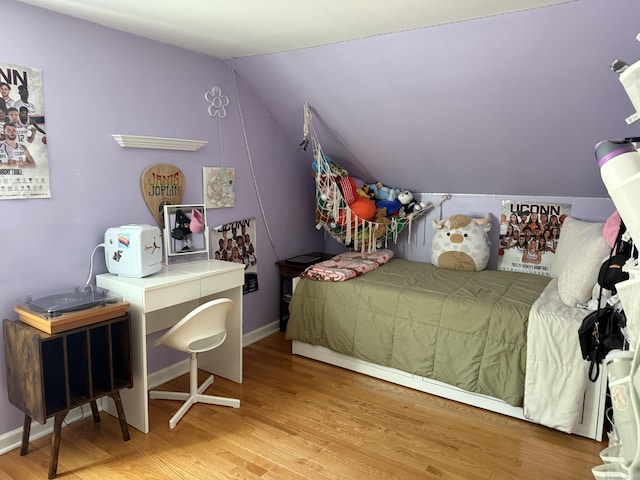 30 May St, Meriden, CT 06451 - bedroom featuring wood finished floors, vaulted ceiling, and baseboards