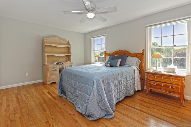 684 Aspen Ln, Orange, CT 06477 - bedroom with light wood-style flooring, baseboards, and ceiling fan