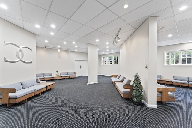 common area with recessed lighting and a drop ceiling