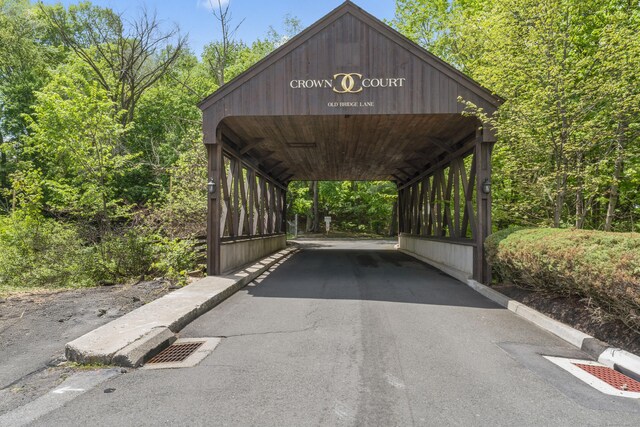 view of parking / parking lot with a detached carport