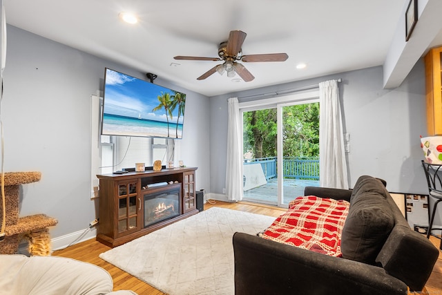 77 Cedar St, Norwalk, CT 06854 - living area with ceiling fan, baseboards, wood finished floors, and recessed lighting