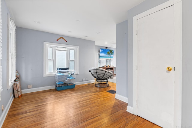 77 Cedar St, Norwalk, CT 06854 - entryway with wood finished floors, baseboards, and recessed lighting