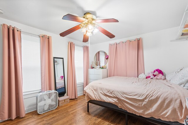 77 Cedar St, Norwalk, CT 06854 - bedroom featuring wood finished floors and ceiling fan