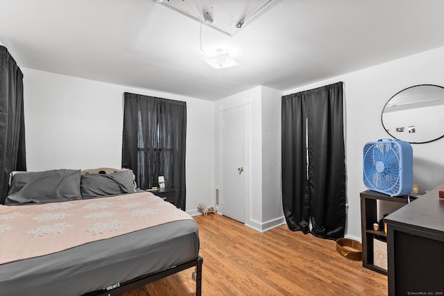 77 Cedar St, Norwalk, CT 06854 - bedroom featuring attic access and light wood-style floors
