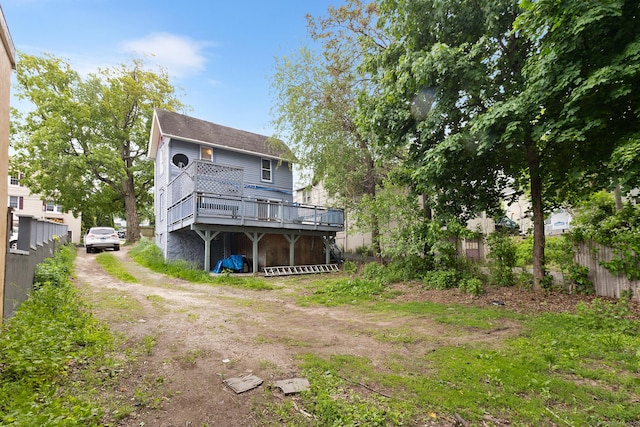 77 Cedar St, Norwalk, CT 06854 - rear view of property with a deck and dirt driveway