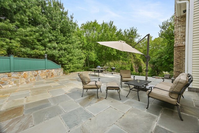 260 Range Rd, Fairfield, CT 06890 - view of patio / terrace with outdoor dining area and fence