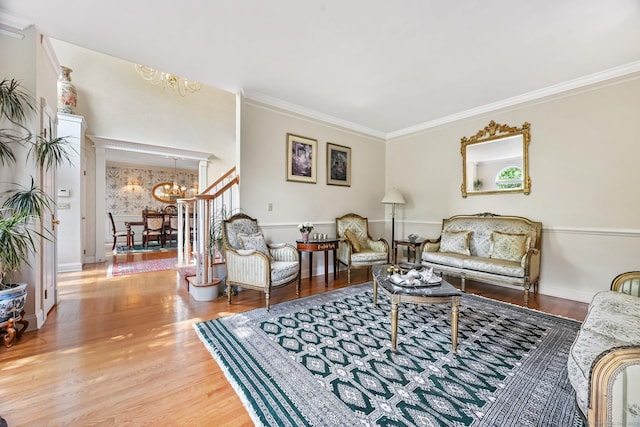 260 Range Rd, Fairfield, CT 06890 - living area featuring a chandelier, wood finished floors, ornamental molding, and baseboards