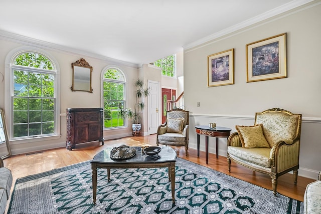 260 Range Rd, Fairfield, CT 06890 - living room featuring crown molding, stairway, wood finished floors, and baseboards