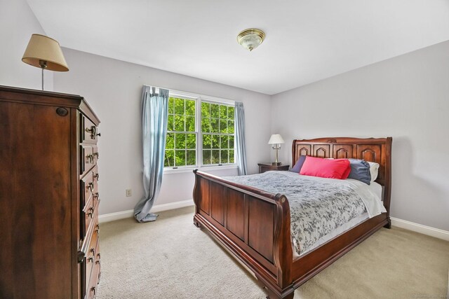 260 Range Rd, Fairfield, CT 06890 - bedroom featuring light colored carpet and baseboards