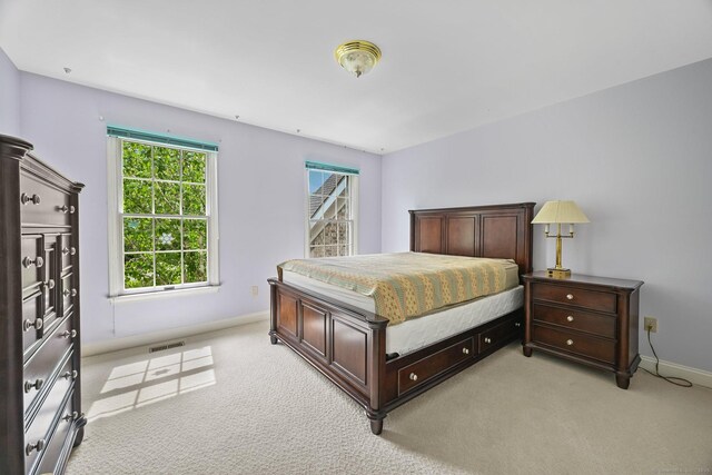 260 Range Rd, Fairfield, CT 06890 - bedroom featuring light carpet and baseboards