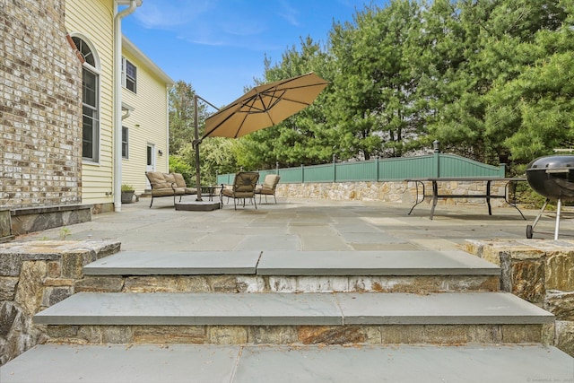 260 Range Rd, Fairfield, CT 06890 - view of patio featuring an outdoor living space and fence
