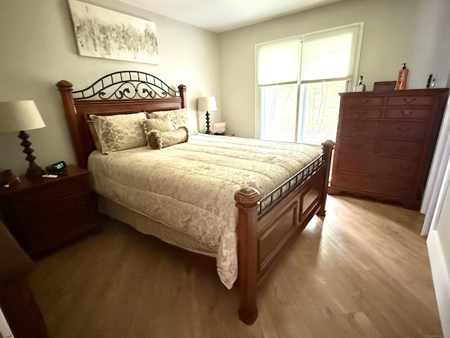 bedroom featuring light wood-style floors