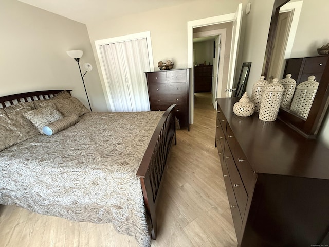 bedroom with light wood-type flooring