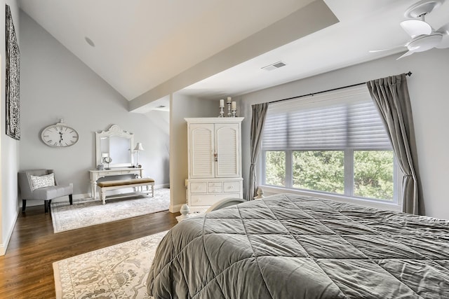 bedroom featuring dark wood finished floors and baseboards