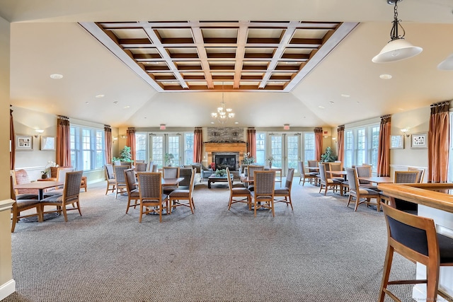 carpeted dining room with recessed lighting, a fireplace, and coffered ceiling