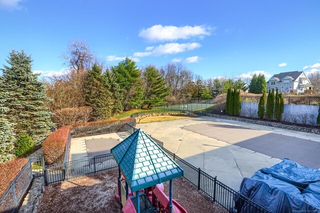 surrounding community with a patio area