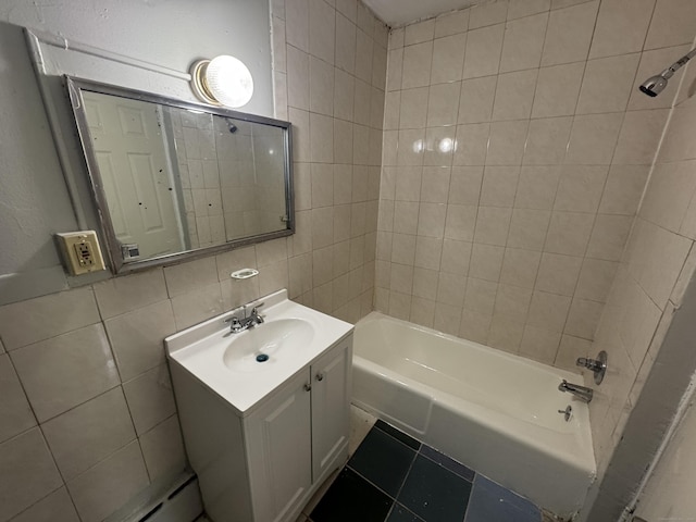 143 Putnam St, Hartford, CT 06106 - bathroom with vanity, tile walls, and washtub / shower combination