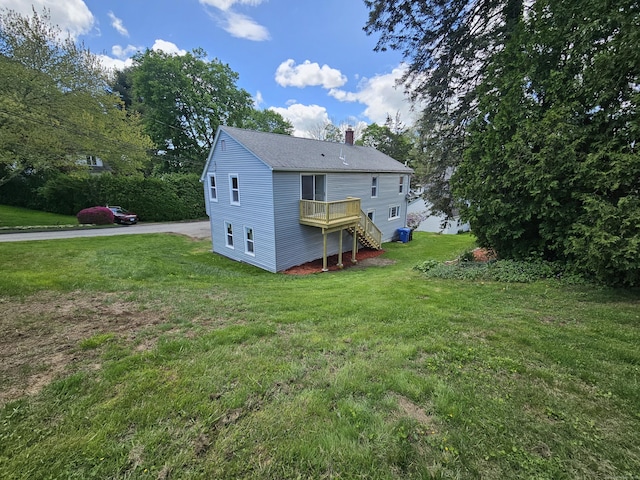 1 Arlington Hts, Norwich, CT 06360 - back of house with a chimney, stairway, a yard, a deck, and a shingled roof