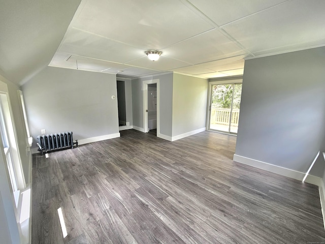 1 Arlington Hts, Norwich, CT 06360 - unfurnished living room with attic access, radiator, dark wood finished floors, and baseboards