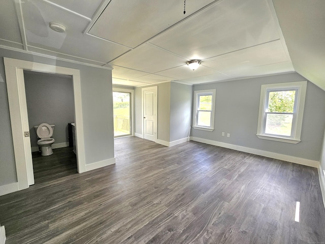 1 Arlington Hts, Norwich, CT 06360 - empty room with dark wood-style flooring, baseboards, a smoke detector, and vaulted ceiling