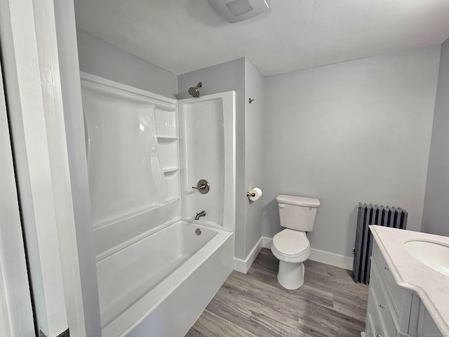 1 Arlington Hts, Norwich, CT 06360 - full bathroom with radiator heating unit, wood finished floors, toilet, baseboards, and vanity