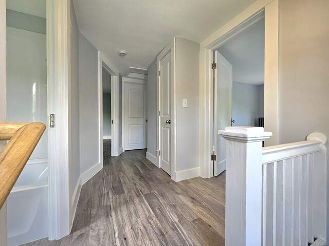 1 Arlington Hts, Norwich, CT 06360 - hallway featuring an upstairs landing, wood finished floors, and baseboards