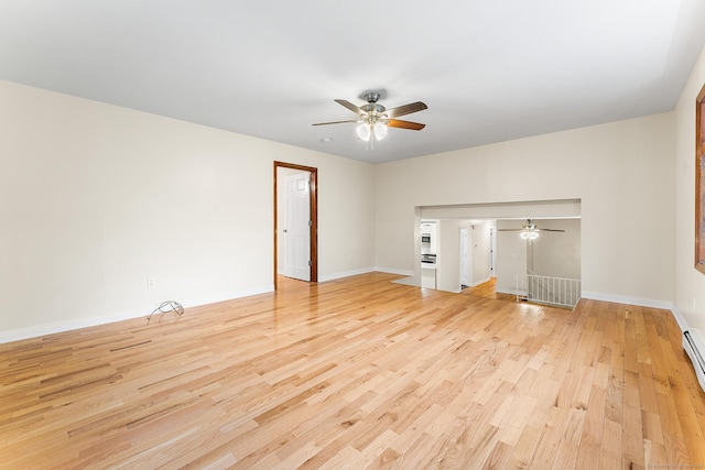 unfurnished living room featuring ceiling fan, light wood finished floors, and baseboards
