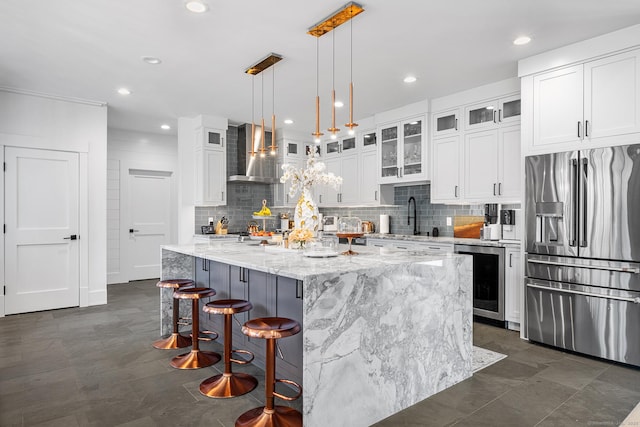 100 Georgetown Rd, Weston, CT 06883 - kitchen featuring stainless steel fridge with ice dispenser, wall chimney range hood, beverage cooler, a sink, and white cabinetry