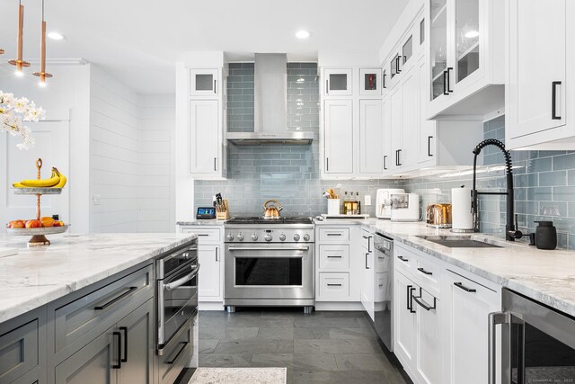 100 Georgetown Rd, Weston, CT 06883 - kitchen with appliances with stainless steel finishes, wall chimney exhaust hood, wine cooler, a sink, and white cabinets