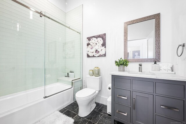 100 Georgetown Rd, Weston, CT 06883 - bathroom featuring toilet, vanity, and combined bath / shower with glass door