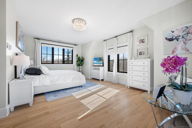 100 Georgetown Rd, Weston, CT 06883 - bedroom with light wood-style floors and baseboards