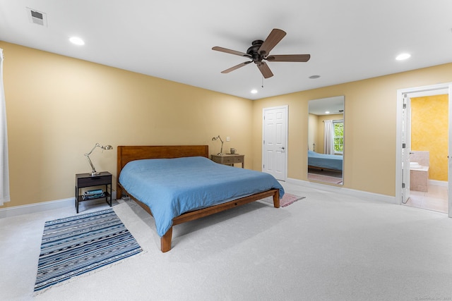 bedroom featuring carpet, baseboards, recessed lighting, ensuite bath, and ceiling fan