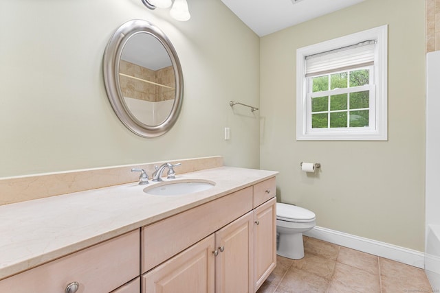 full bathroom featuring toilet, baseboards, vanity, a tub to relax in, and a shower