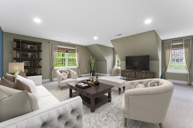 living room with baseboards, light colored carpet, recessed lighting, and vaulted ceiling