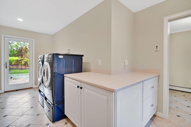washroom featuring washing machine and clothes dryer, cabinet space, a baseboard radiator, light tile patterned flooring, and recessed lighting