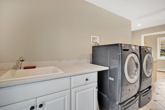 washroom featuring independent washer and dryer, cabinet space, and recessed lighting