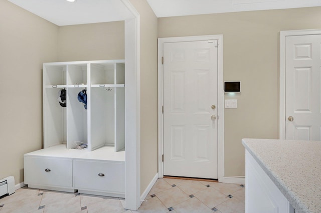 mudroom with baseboards and baseboard heating