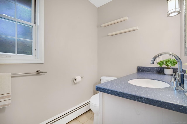 bathroom featuring toilet, tile patterned floors, and vanity