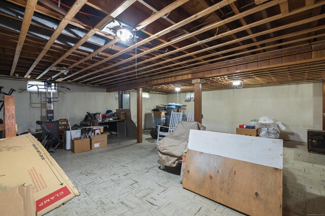 finished basement featuring electric panel