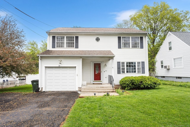 view of front of house with an attached garage and driveway