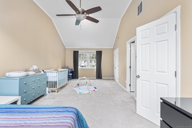 bedroom with carpet flooring, a ceiling fan, baseboards, and high vaulted ceiling