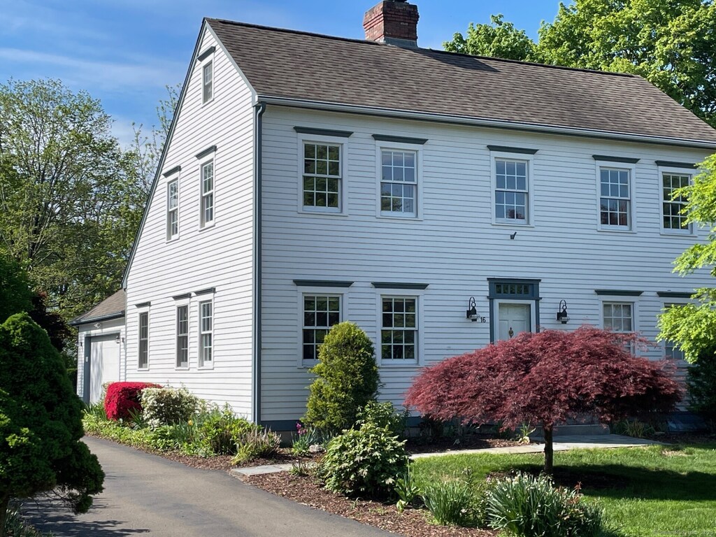 16 N St, Guilford, CT 06437 - colonial inspired home with a chimney and roof with shingles