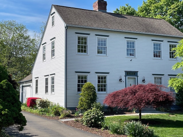 16 N St, Guilford, CT 06437 - colonial inspired home with a chimney and roof with shingles